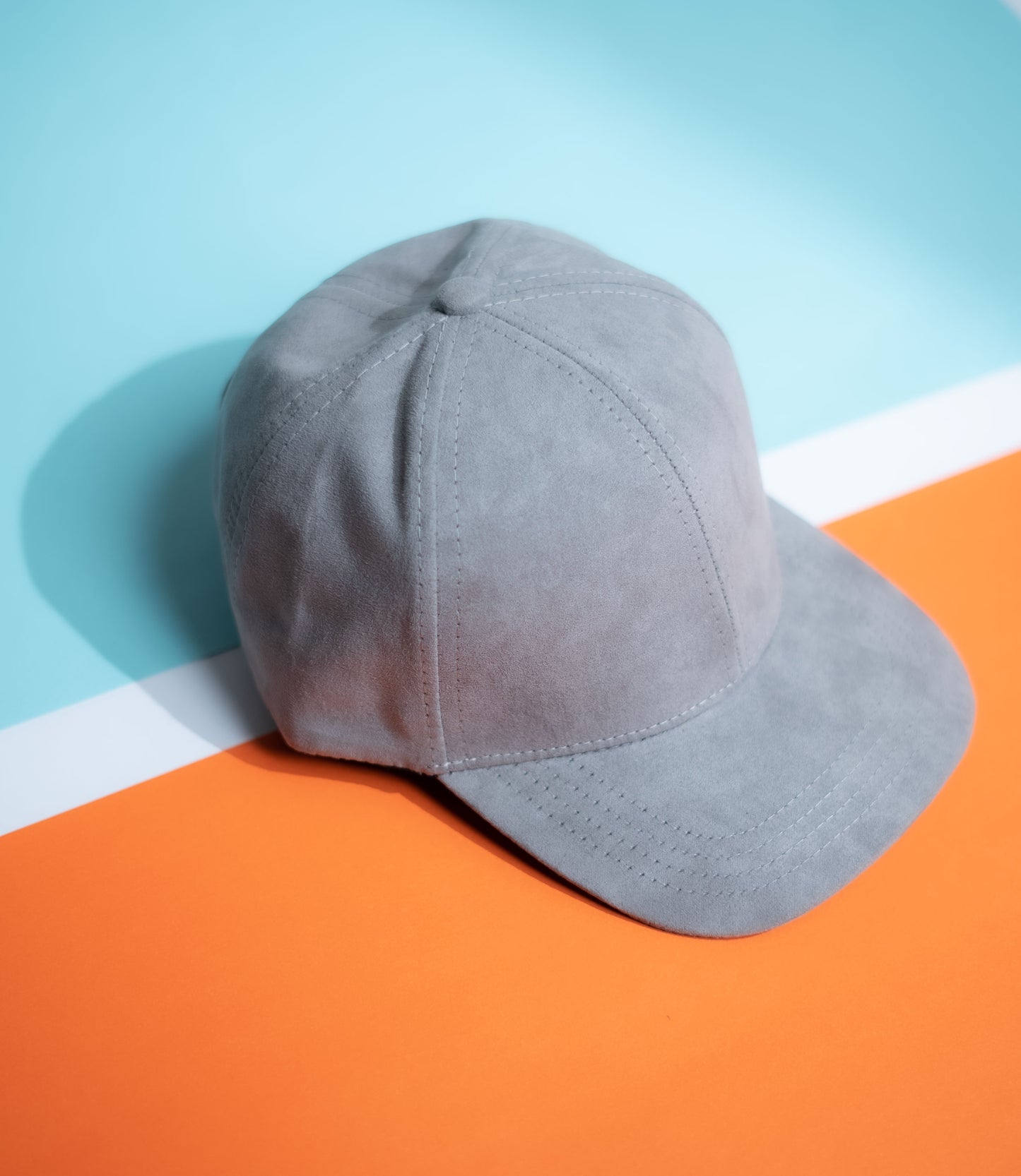 Gray cap on a colorful background in Pakistan by Caps Nation