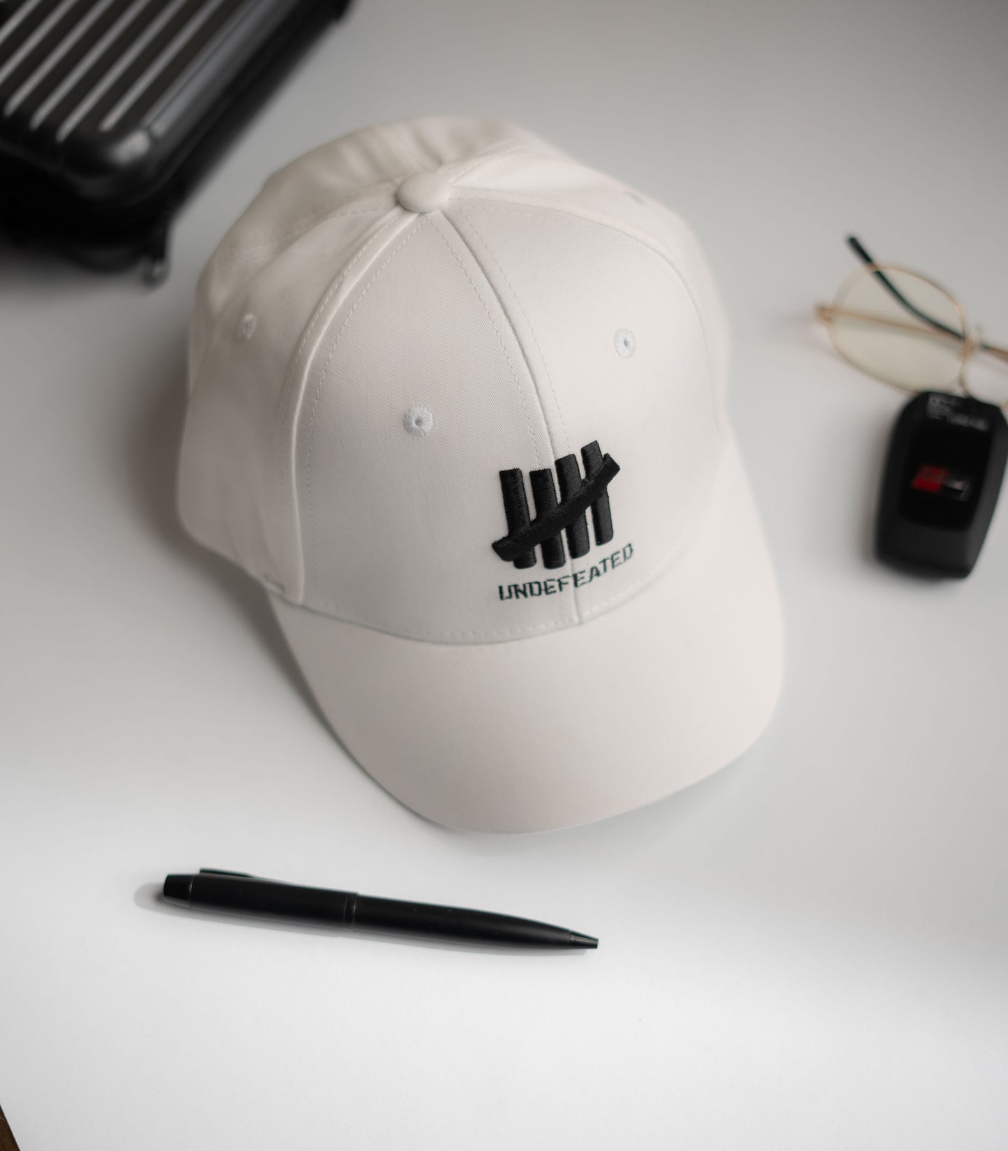 White Undeafeated Cap -IMP54 (Small Visor)
