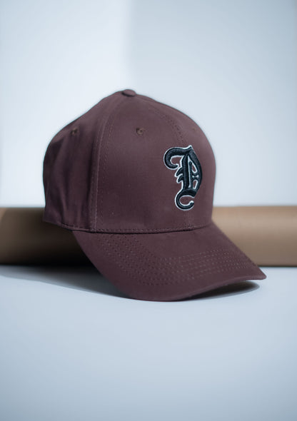 Brown D Cap -IMP46