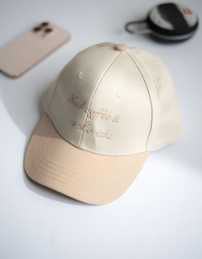 Beige cap with text on a light gray surface in Pakistan by Caps Nation