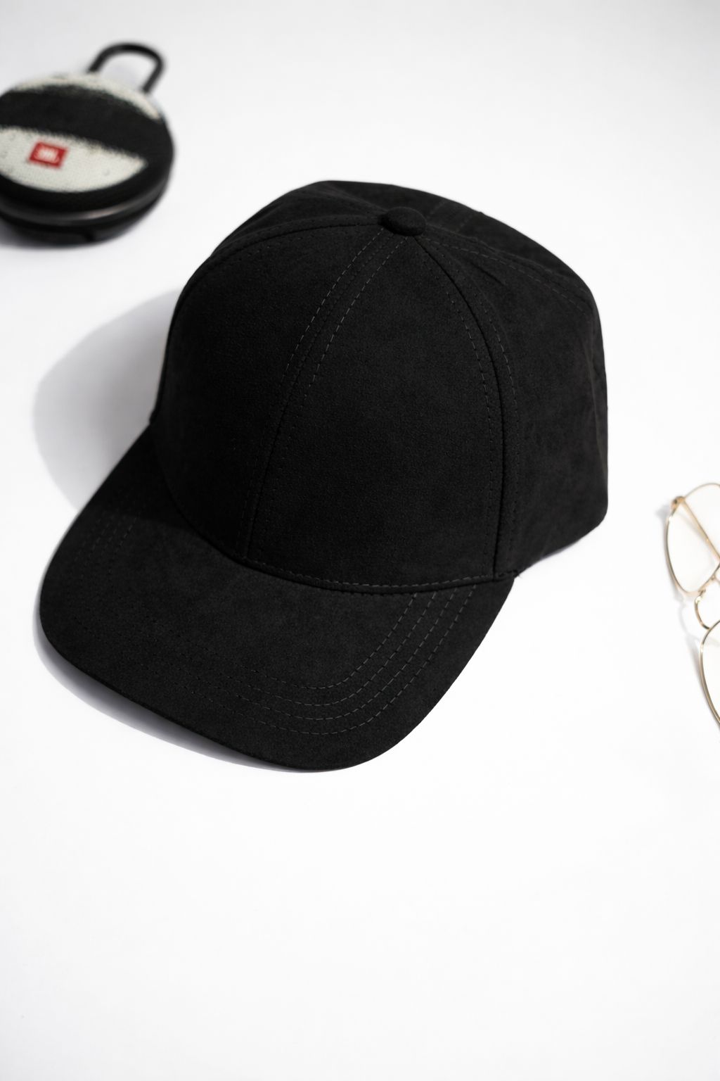 Black baseball cap on a white background in Pakistan by Caps Nation