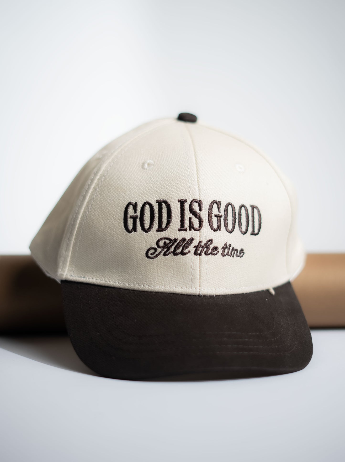 Cap with 'God is Good All the time' text on a white background in Pakistan by Caps Nation