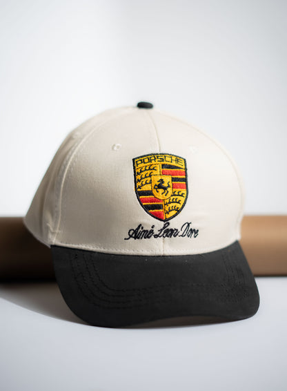 Cap with Porsche logo on a white background in Pakistan by Caps Nation