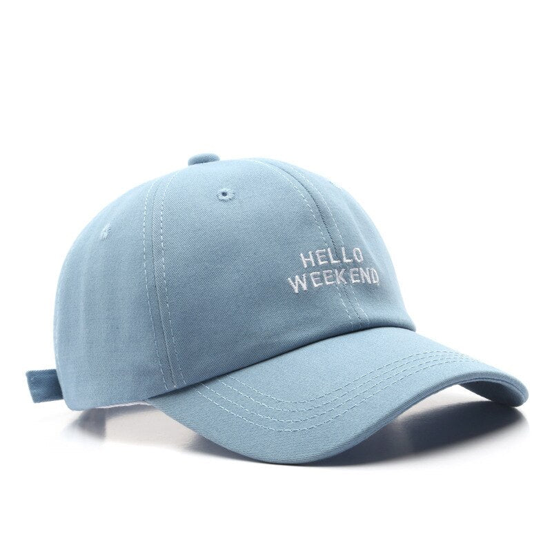 Light blue cap with 'Hello Weekend' text on a white background in Pakistan by Caps Nation