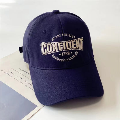 Navy blue cap with gold text on a light gray background in Pakistan by Caps Nation