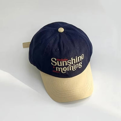 Navy and beige cap with 'Sunshine morning' text on a white background in Pakistan by Caps Nation