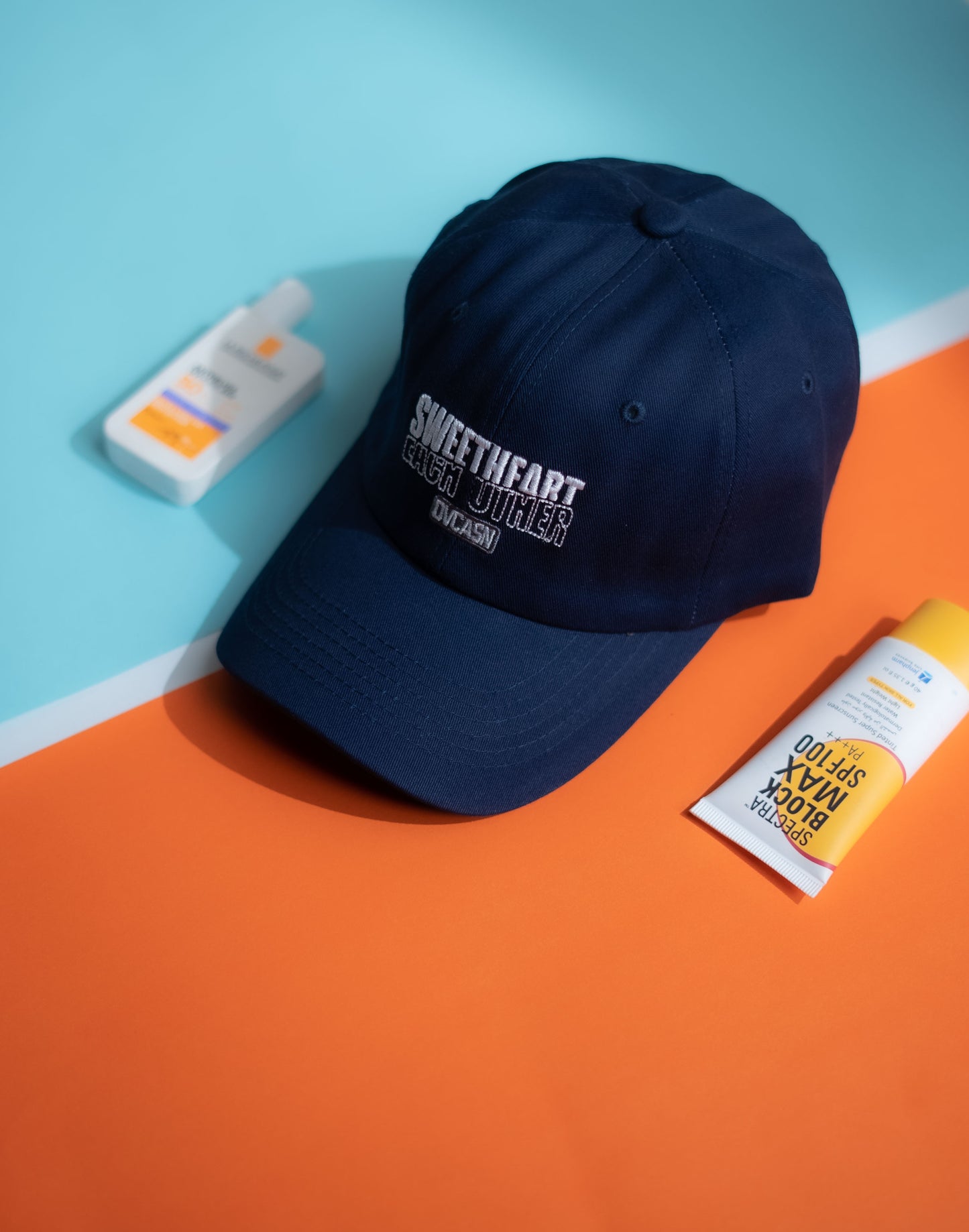 Navy blue cap with 'Sweetheart' text on a blue and orange background in Pakistan by Caps Nation