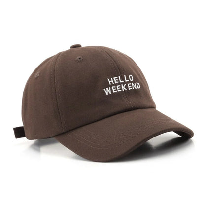 Brown cap with 'HELLO WEEKEND' text on a white background in Pakistan by Caps Nation