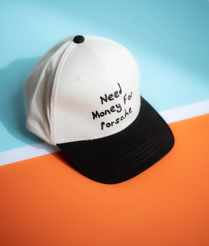 Cap with 'Need for Money for Porsche' text on a blue and orange background in Pakistan by Caps Nation