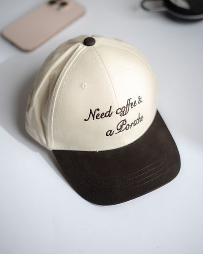 Beige and black cap with text on a white surface in Pakistan by Caps Nation