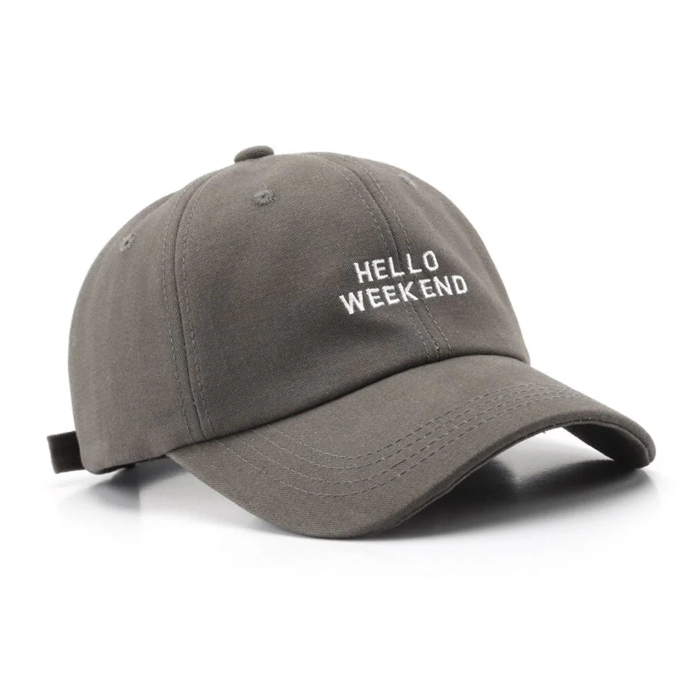 Gray cap with 'HELLO WEEKEND' text on a white background in Pakistan by Caps Nation