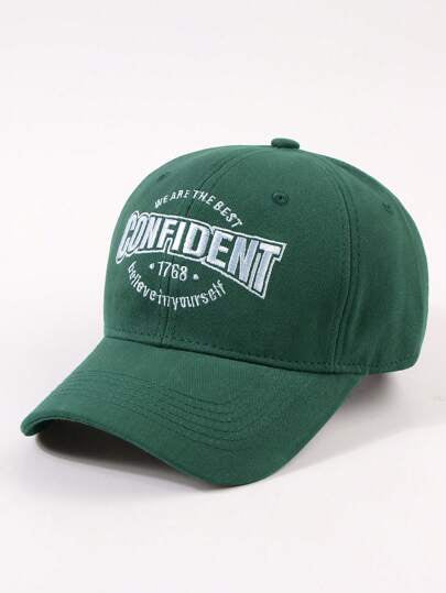 Green cap with motivational text on a light background in Pakistan by Caps Nation