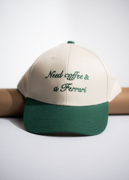 Beige and green cap with 'Need coffee & a Ferrari' text on a white background in Pakistan by Caps Nation