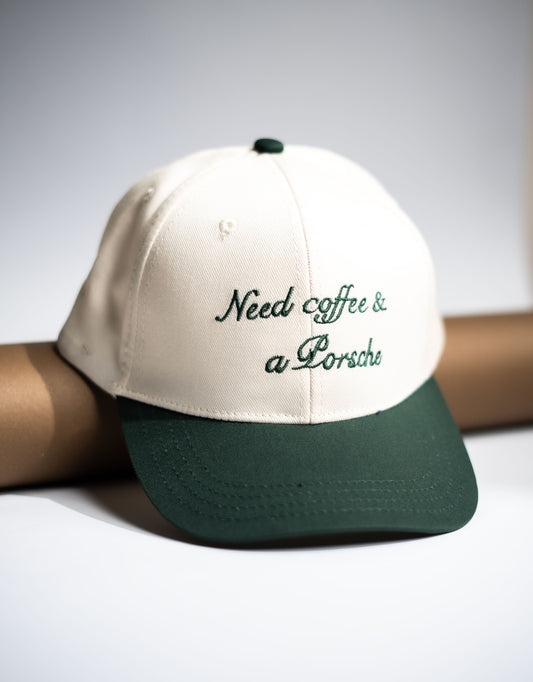 Cap with 'Need coffee & a Porsche' text on a neutral background in Pakistan by Caps Nation