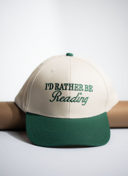 Cap with 'I'd Rather Be Reading' text on a white background in Pakistan by Caps Nation