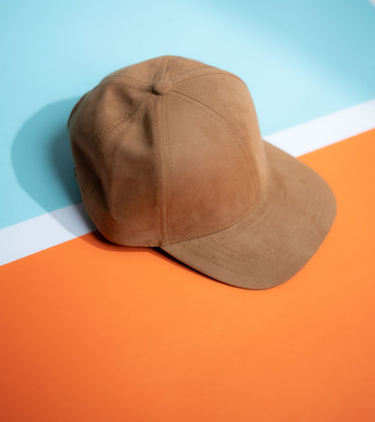 Brown cap on a colorful geometric background in Pakistan by Caps Nation