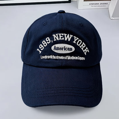 Navy blue cap with text on a light gray background in Pakistan by Caps Nation