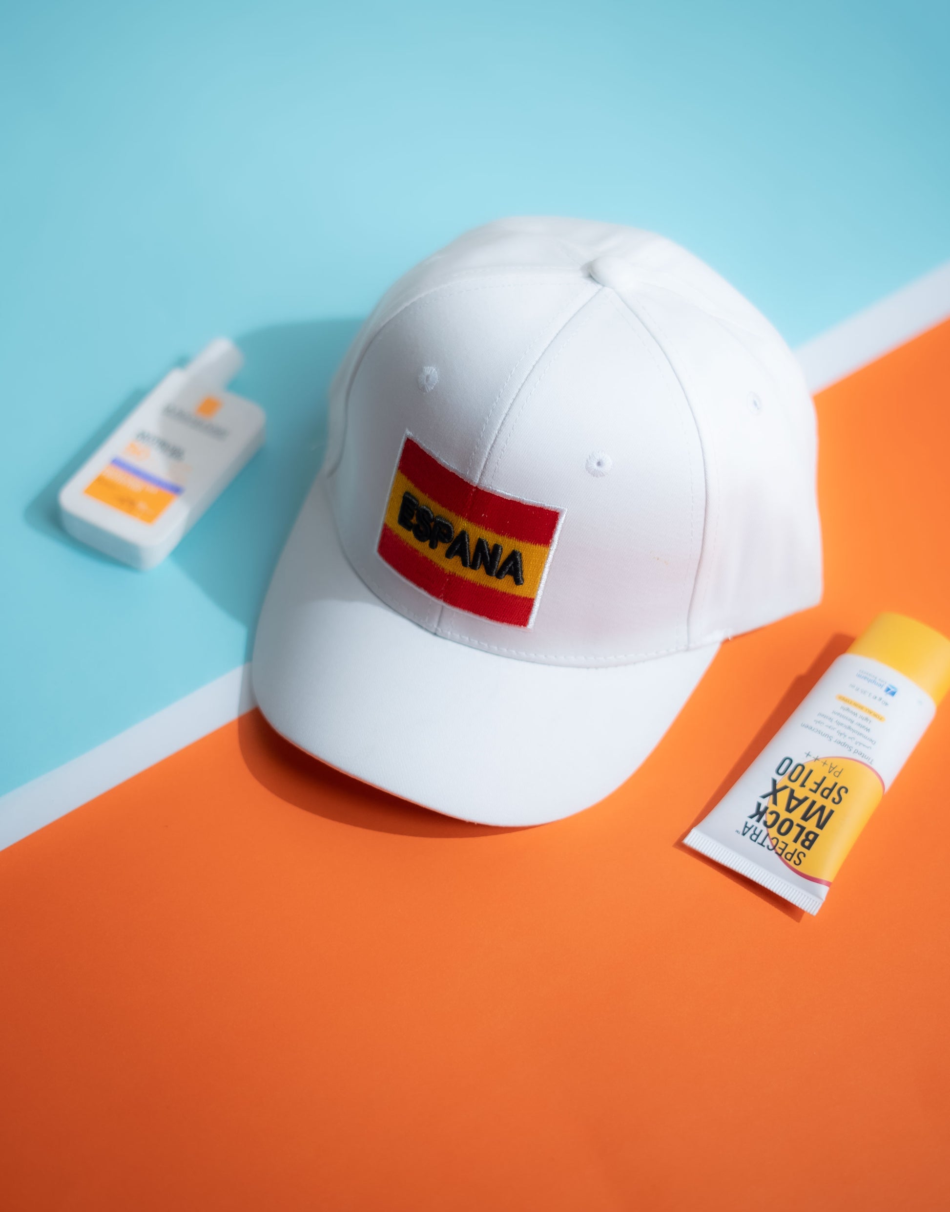White cap with a logo on a colorful geometric background in Pakistan by Caps Nation