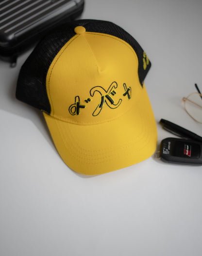 Yellow and black cap with text on a white surface in Pakistan by Caps Nation
